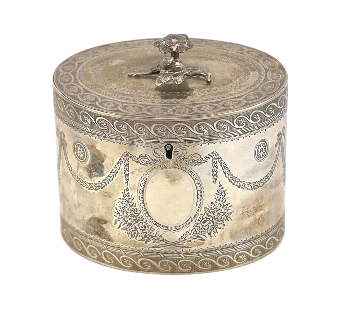 A George III engraved silver ova tea caddy, by Thomas Daniell